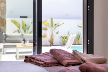 Towels in Bedroom with Garden View