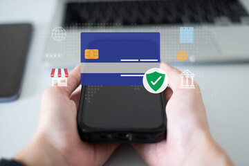 Person using credit card in online digital payment mobile banking money transfer laptop smartphone transaction internet with password security information encryption identity verification protection