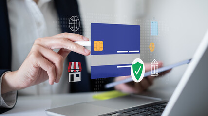 Person using credit card in online digital payment mobile banking money transfer laptop smartphone transaction internet with password security information encryption identity verification protection