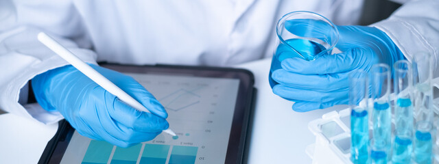 Scientist working in laboratory science chemistry research discovery experiment report results analysis innovation document test biotechnology biochemistry education hospital medical healthcare cancer