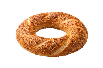 Close up of a simit, a circular turkish bread covered in sesame seeds, on white background