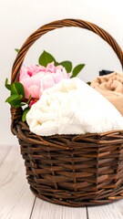 Basket filled with clothes and flowers