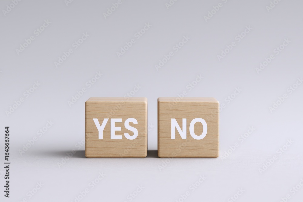 Aufkleber decision making: wooden blocks displaying 'yes' and 'no' choices for business strategy and option se