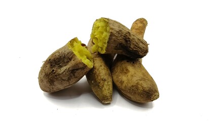 Group of Delicious baked yellow sweet potatoes isolated on white background