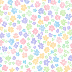 Seamless pattern of small pastel flowers on a white background