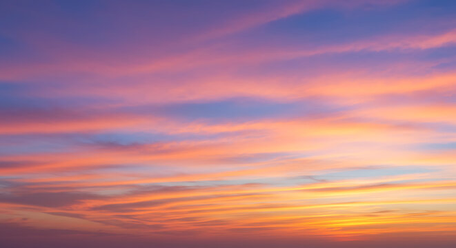 Beautiful sunset sky with colorful clouds creating a serene and peaceful scene - Powered by Adobe
