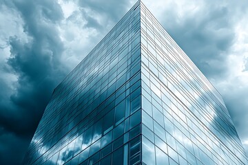 Skycraper architecture modern building reflecting clouds business skyline urban office glass facade commercial real