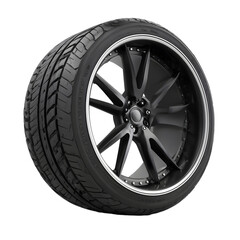 Obraz premium High-performance black alloy car wheel with low-profile tire, modern automotive rim design isolated on white background for vehicle customization and racing concepts