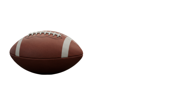 A classic unbranded American football, rich brown leather, white laces & stripes, on a polished dark wood desk, blurred modern office background with soft studio light. Concept of strategic execution
