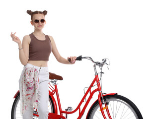 Teenage girl with red bicycle on white background