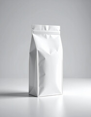 A minimalist mockup of a plain white coffee bag on a neutral grey background.