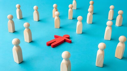 Obraz premium Social Exclusion Concept – Isolation, Group Dynamics, Individual Focus, Abstract, Conceptual, Wooden Figurines, Red Figure, Blue Background