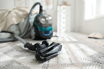 One vacuum cleaner on floor indoors, closeup