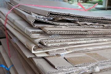 Recycle Flatten cardboard boxes ,corrugated cardboard after use to being recycled.