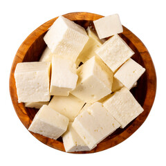 Brynza cheese isolated on white background. Diced soft sheep's cheese bryndza in wooden bowl. Top view.