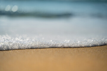 écume des vague sur la plage