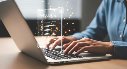 Person typing on laptop with policies checklist graphic overlay and sparkling light effects around it