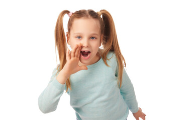 A young girl with two ponytails joyfully shouts while wearing a light blue sweater. Her expression...