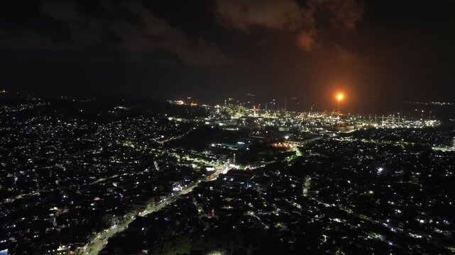 Original, unedited night drone footage of Balikpapan, August 9, 2025, capturing the serene close of night with city lights and coastal skyline.