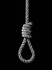 A noose hangs against a black backdrop