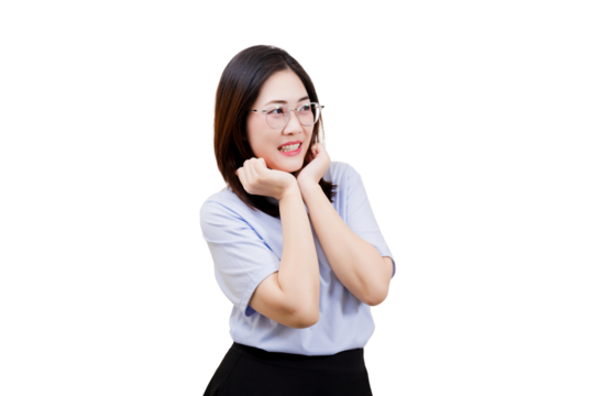 Asian young beautiful woman with glasses shows a playful expression, clasping her hands under her chin in an engaging pose.