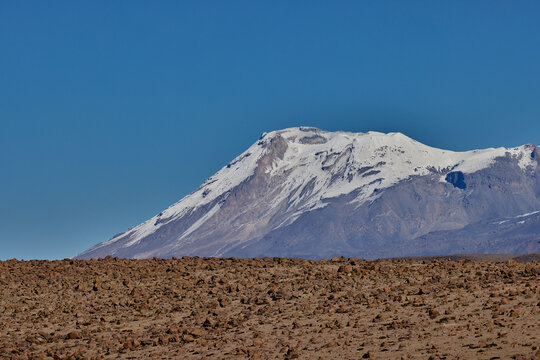 Majestic and remote, Ampato Volcano rises above the Andean highlands &mdash; a silent witness to history and guardian of ancient secrets