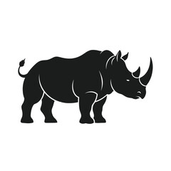 Silhouetted rhinoceros standing on a white background, its form boldly outlined,Rhino silhouette with distinctive horn and stocky build against a plain backdrop