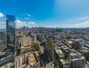 Aerial city scape of skyscraper buildings SoHo Manhattan on a sunny summer day in New York City