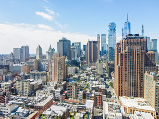 Obraz premium Aerial city scape of skyscraper buildings SoHo Manhattan on a sunny summer day in New York City