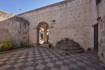 The Cloisters of the Company showcase elegant colonial architecture carved from white volcanic...