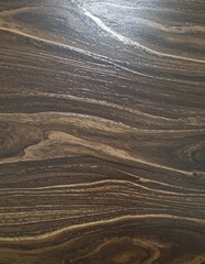 Fototapeta premium Dark brown wood grain texture