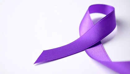 Purple awareness ribbon on white backdrop. Symbol of pancreatic cancer and epilepsy.