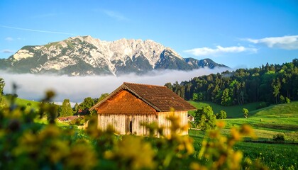 Fototapeta premium Rustic wooden barn in mountainous landscape
