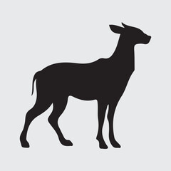 Elegant black silhouette of a standing doe facing right