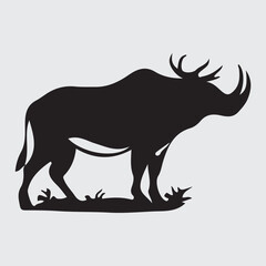 Majestic prehistoric woolly rhinoceros standing in a field silhouette