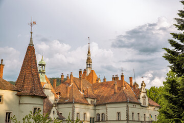 Historic palace of Counts Schonborn with terracotta roofs and towers.