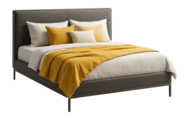 Modern bed with yellow blanket and pillows.
