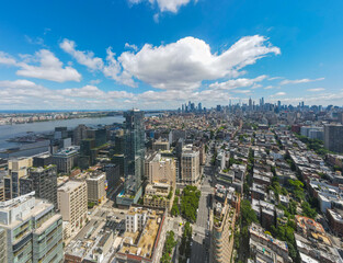 Aerial city scape of skyscraper buildings SoHo Manhattan on a sunny summer day in New York City