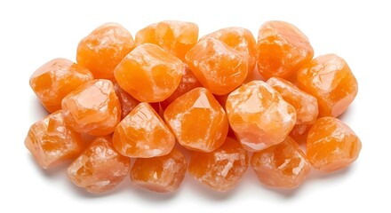 Pile of sweet dried kumquats with glistening skin isolated on white background