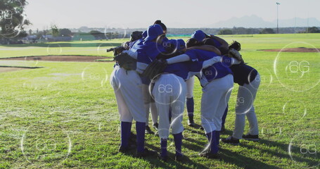 Huddling baseball team wearing blue jerseys and gloves on sunlit field, with floating 6G icons