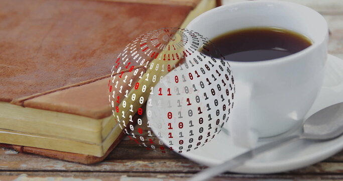 Displaying brown leather-bound notebook on wooden tabletop, with coffee cup and binary sphere