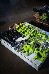 Drift car suspension parts are staged for a suspension build. Vibrant performance suspension...