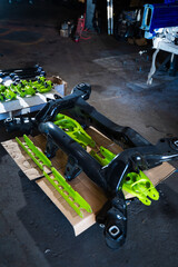 Drift car suspension parts are staged for a suspension build. Vibrant performance suspension...
