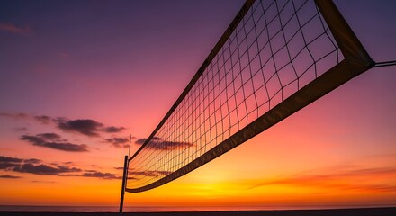 Volleyball net silhouetted against a vibrant sunset sky with shades of orange pink and purple hues