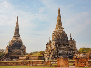 Views of Wat Phra Si Sanphet Ayutthaya's ancient templs and landmarks, showcasing intricate architecture, historical ruins, cultural heritage in serene atmosphere of this UNESCO World Heritage site.