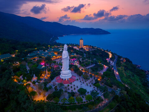 Aerial view of Da nang's lady buddha statue at sunset from son tra peninsula