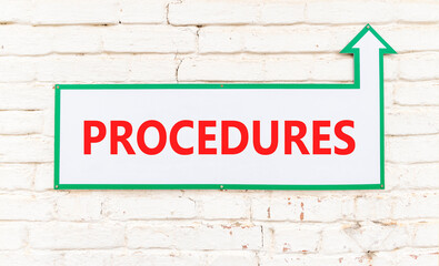 Procedures symbol. Concept word Procedures on beautiful white sign on old white brick wall....