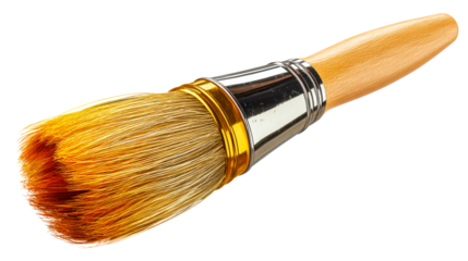 Paintbrush with golden bristles and wooden handle on white