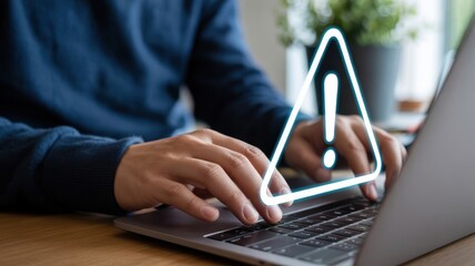 System Warning - A man typing on a laptop, with a glowing triangular warning sign, symbolizing a system error, security alert, or cyber problem