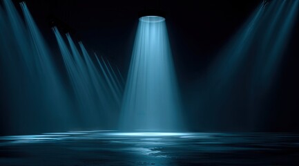 Teal spotlights illuminate a dark, reflective floor, creating a dramatic, atmospheric scene with converging beams of light